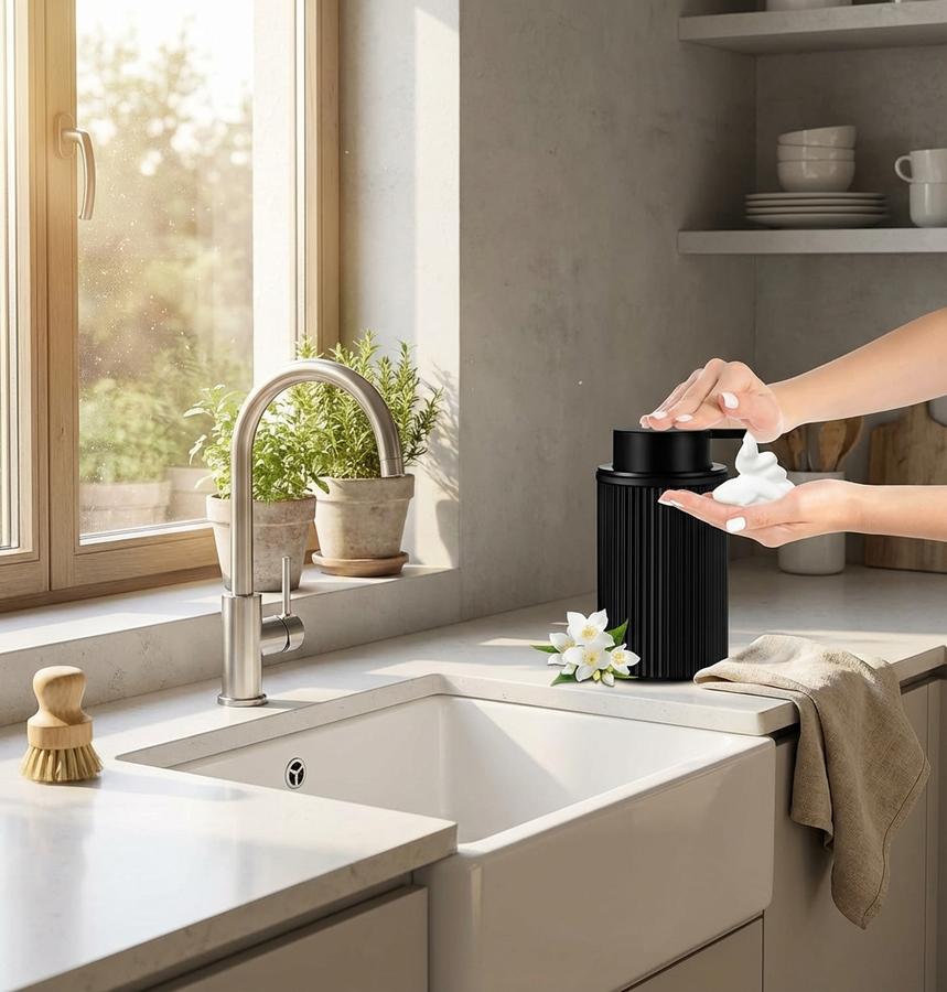 Matte black foaming soap dispenser at kitchen sink